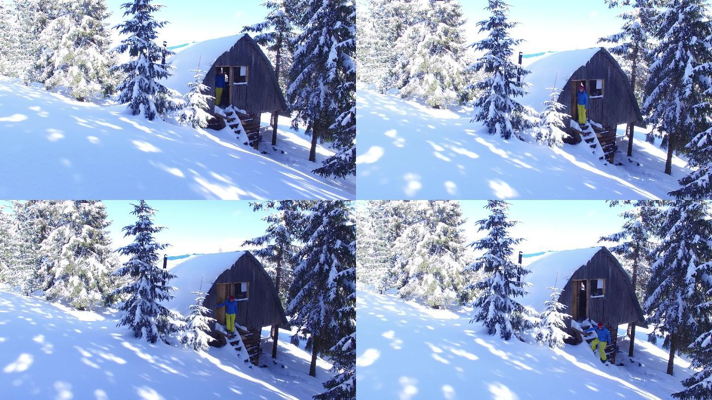雪山上的小木屋冬季小屋旅游
