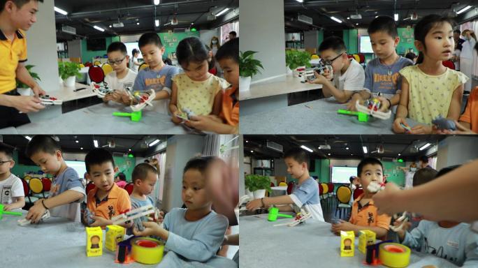 小朋友展示人工智能创客教育作品玩具