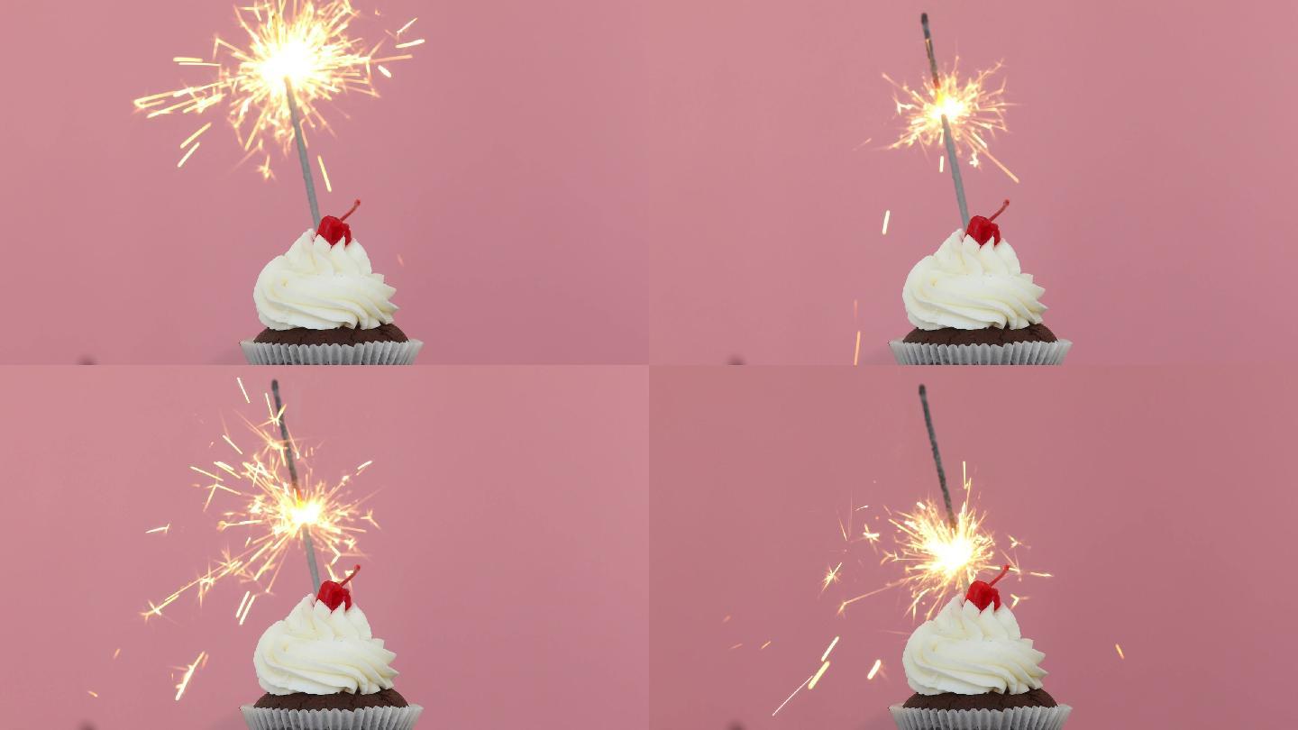 生日纸杯蛋糕，背景为亮粉色