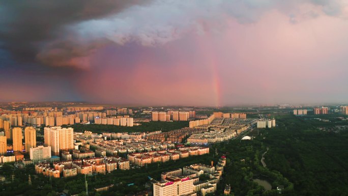4K哈尔滨城市日落下雨彩虹航拍