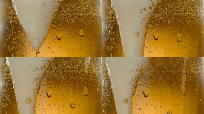 杯子里的啤酒泡沫气泡啤酒饮料唯美升格慢镜