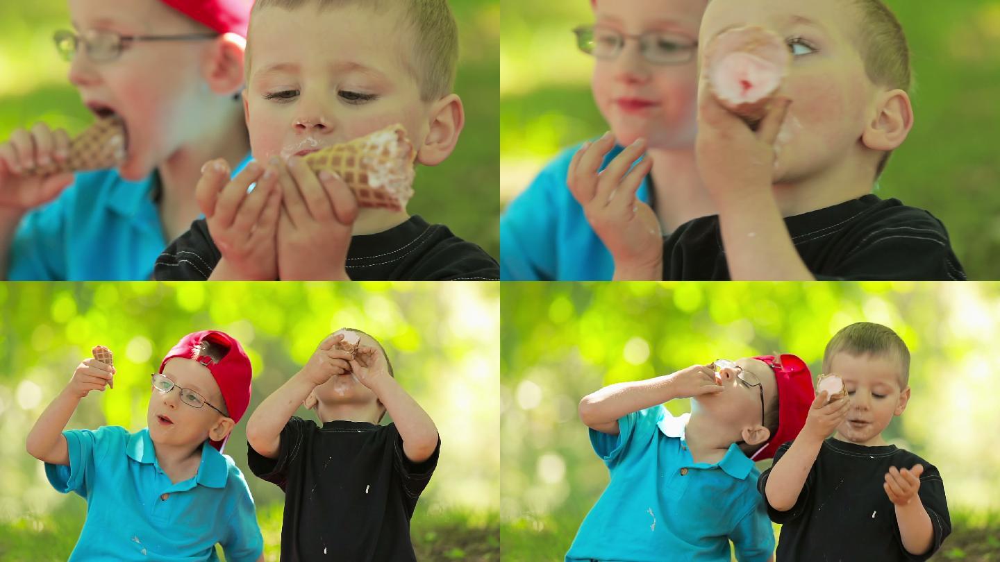 两个男孩吃冰淇淋很开心。