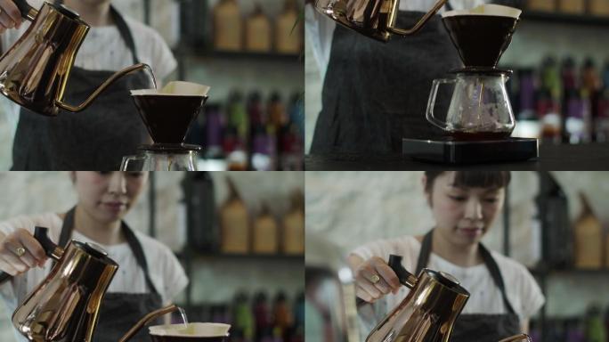 咖啡师把热水倒在磨碎的咖啡豆上