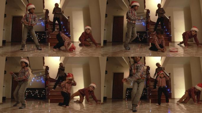 戴着圣诞帽跳舞的孩子们。