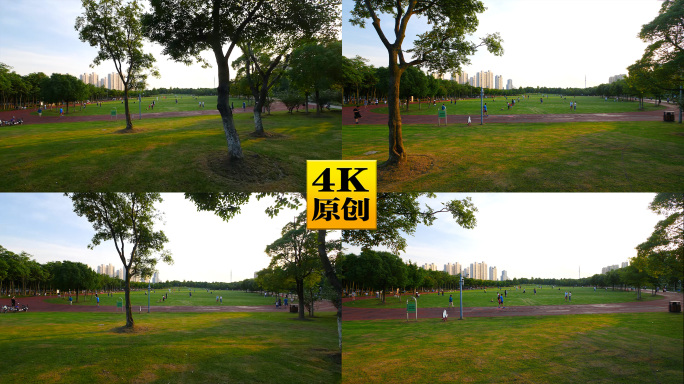 4K原创)夕阳下公园里的大草坪和玩耍的人