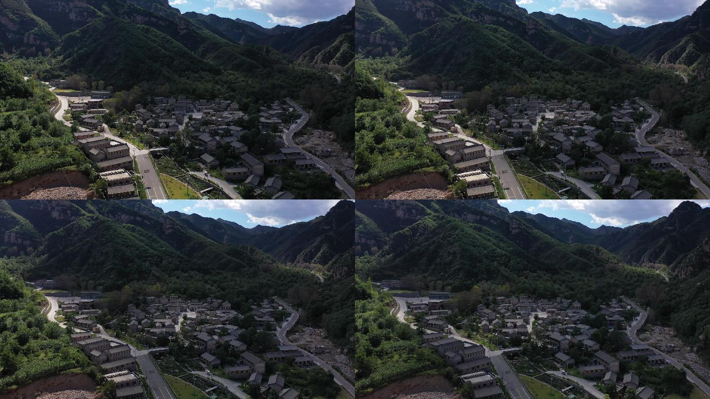 航拍山脉山村云蓝天光影山路