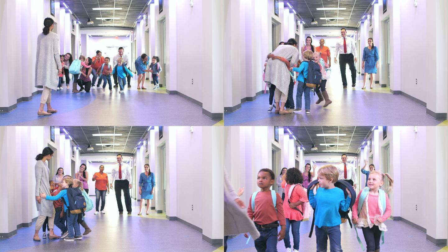 一群家长在学校走廊里向他们的孩子告别