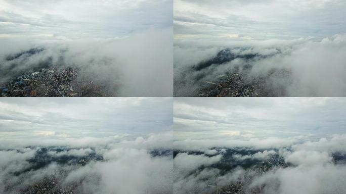 城市高空穿过云层 平流云