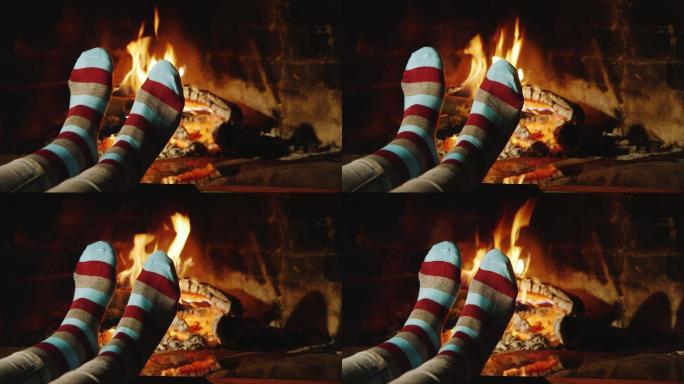 那个女孩在壁炉旁暖脚