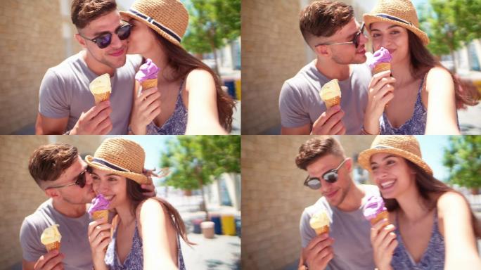 在吃冰淇淋的情侣美丽的人亲吻放松