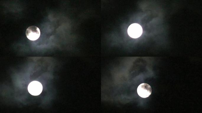 夜晚空中满月穿行在乌云之中1