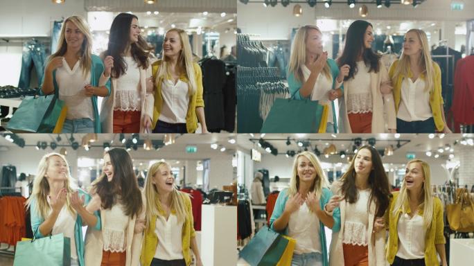 三个女孩在一家服装店购物