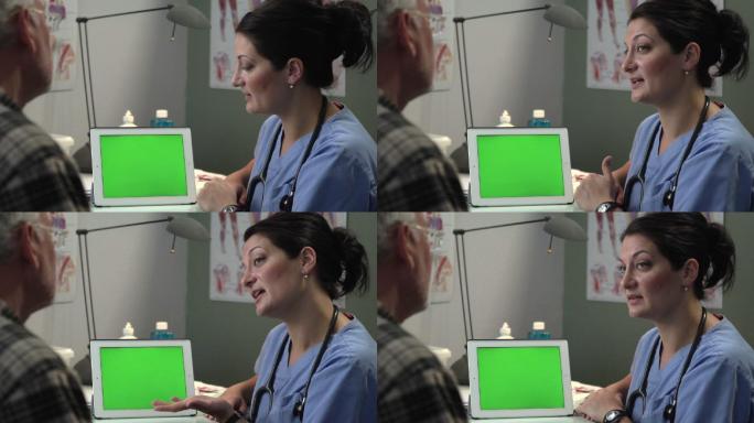 医生在平板电脑/ipad上与患者讨论结果