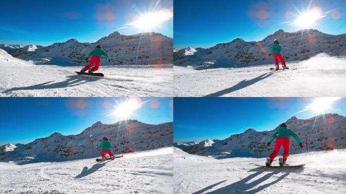 一个滑雪板骑手在积雪覆盖的山坡上滑雪