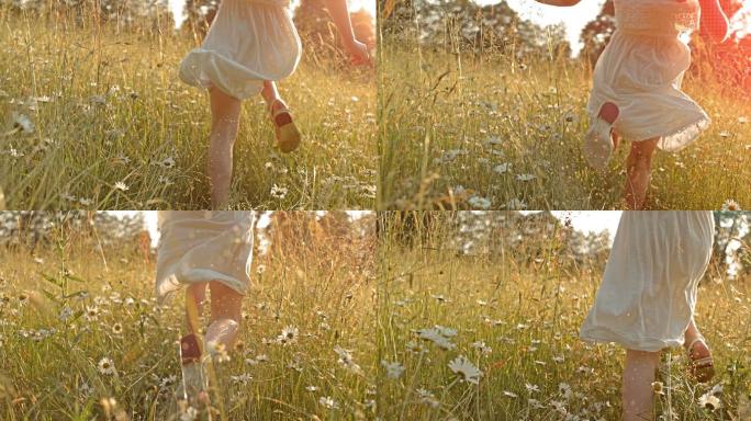 在草丛中奔跑的小女孩