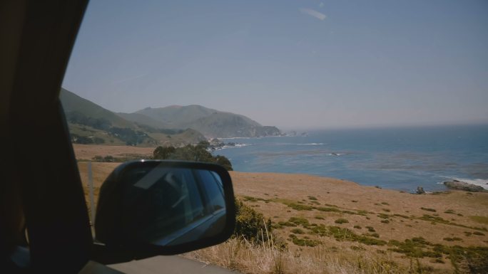 车内拍摄沿路风景海滩海岸和岩石