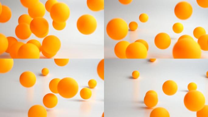 许多橙色的球以慢动作落下