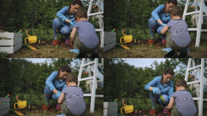 男孩帮助她妈妈种花