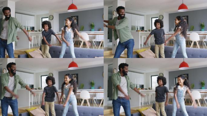 父亲和孩子在客厅跳舞