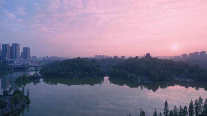 日落城市公园湖空境4k