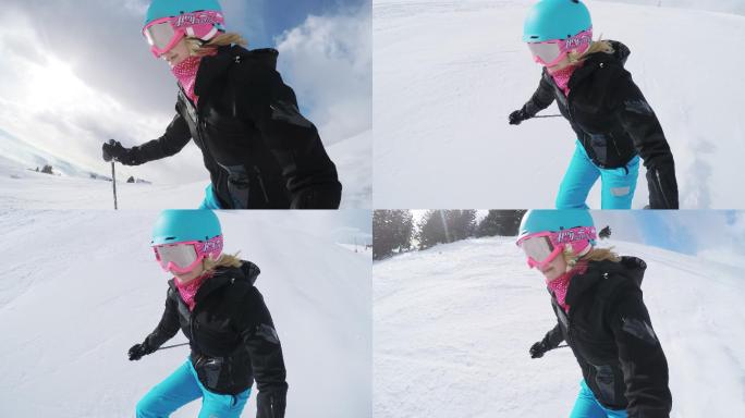 一个女滑雪者滑下滑雪坡的视角。