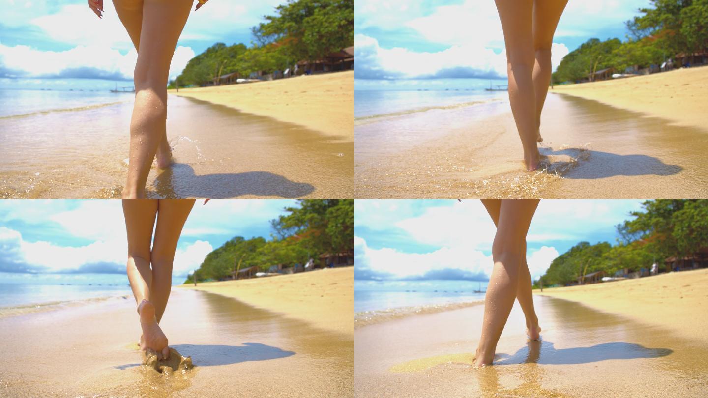 在热带海滩漫步的女人