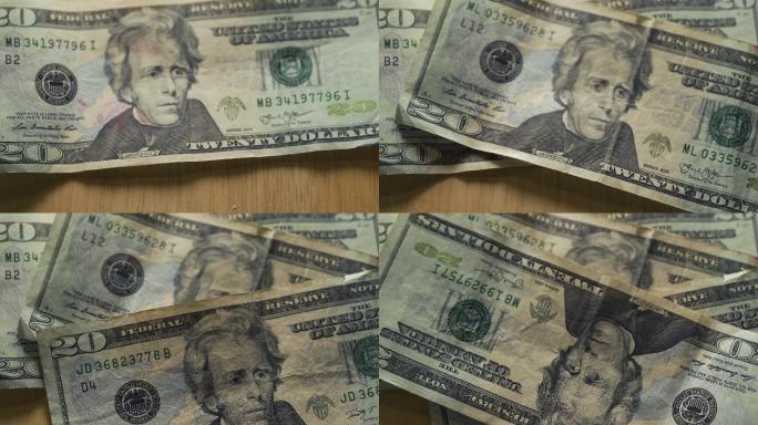 几张20美元的钞票叠在一起的特写镜头。