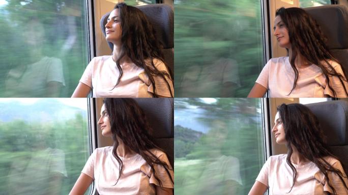 乘火车旅行的年轻美女
