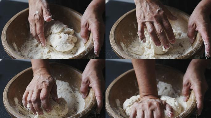 面包师用手揉面团
