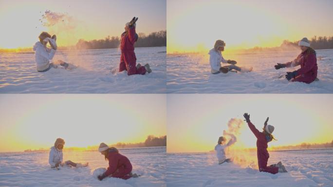 母女在雪中嬉戏女儿早晨自由