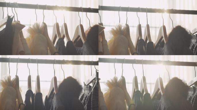 衣架之间的阳光洗衣店晾衣架棉衣棉服