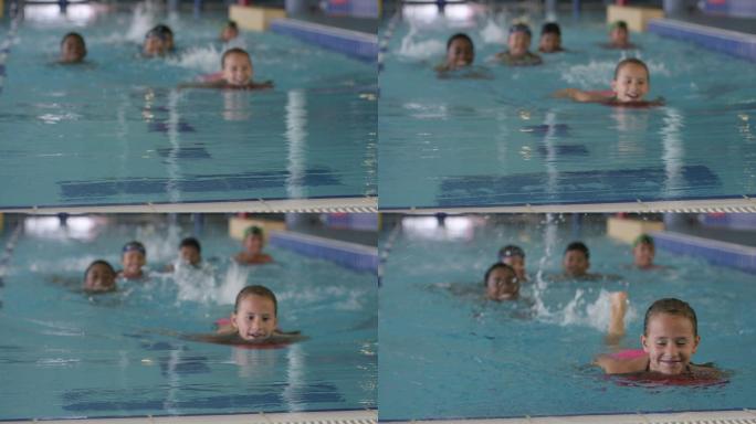 在健身中心游泳的孩子们