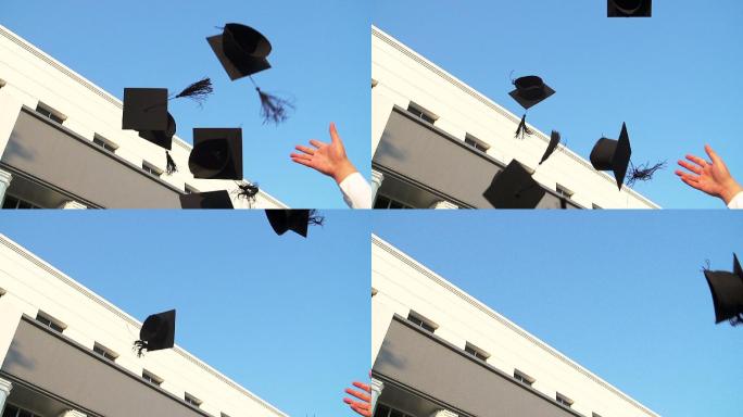 毕业生向空中扔学士帽