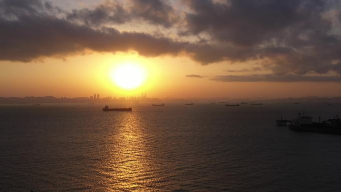 夕阳日出海平面港口船舶