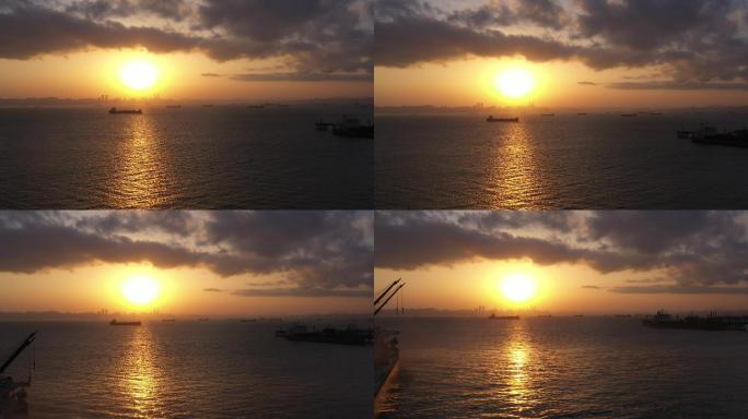 夕阳日出海平面港口船舶