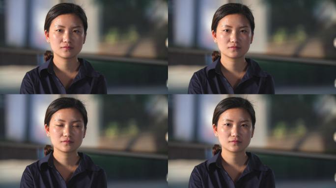 严肃的年轻女子慢镜头特写