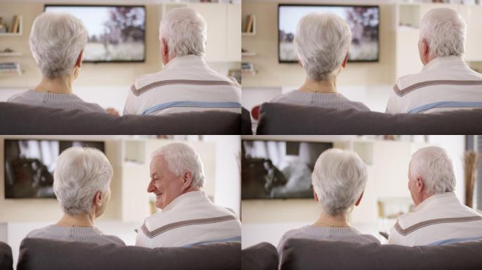 老年夫妇看电视放松