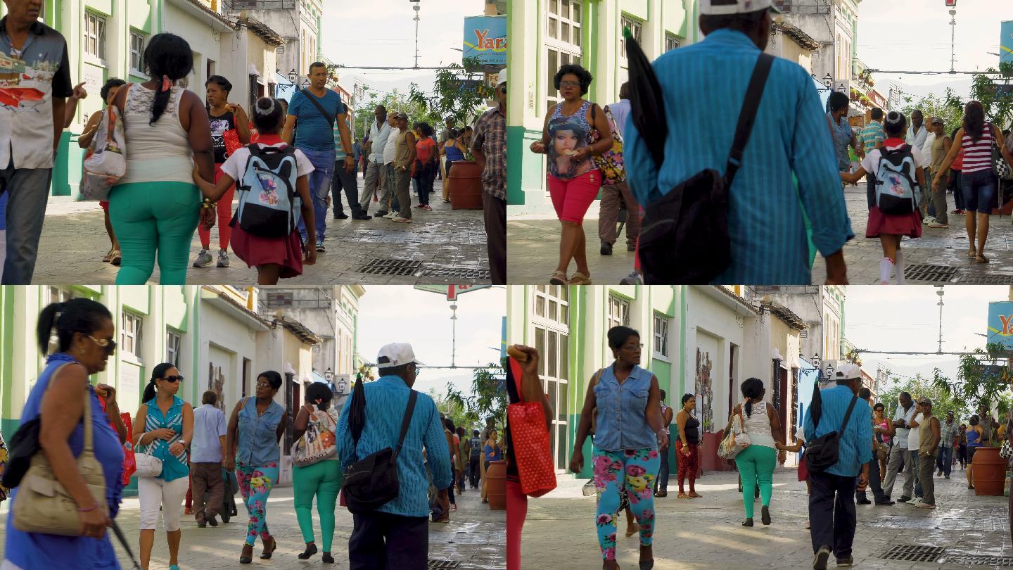 古巴人在圣地亚哥市中心散步