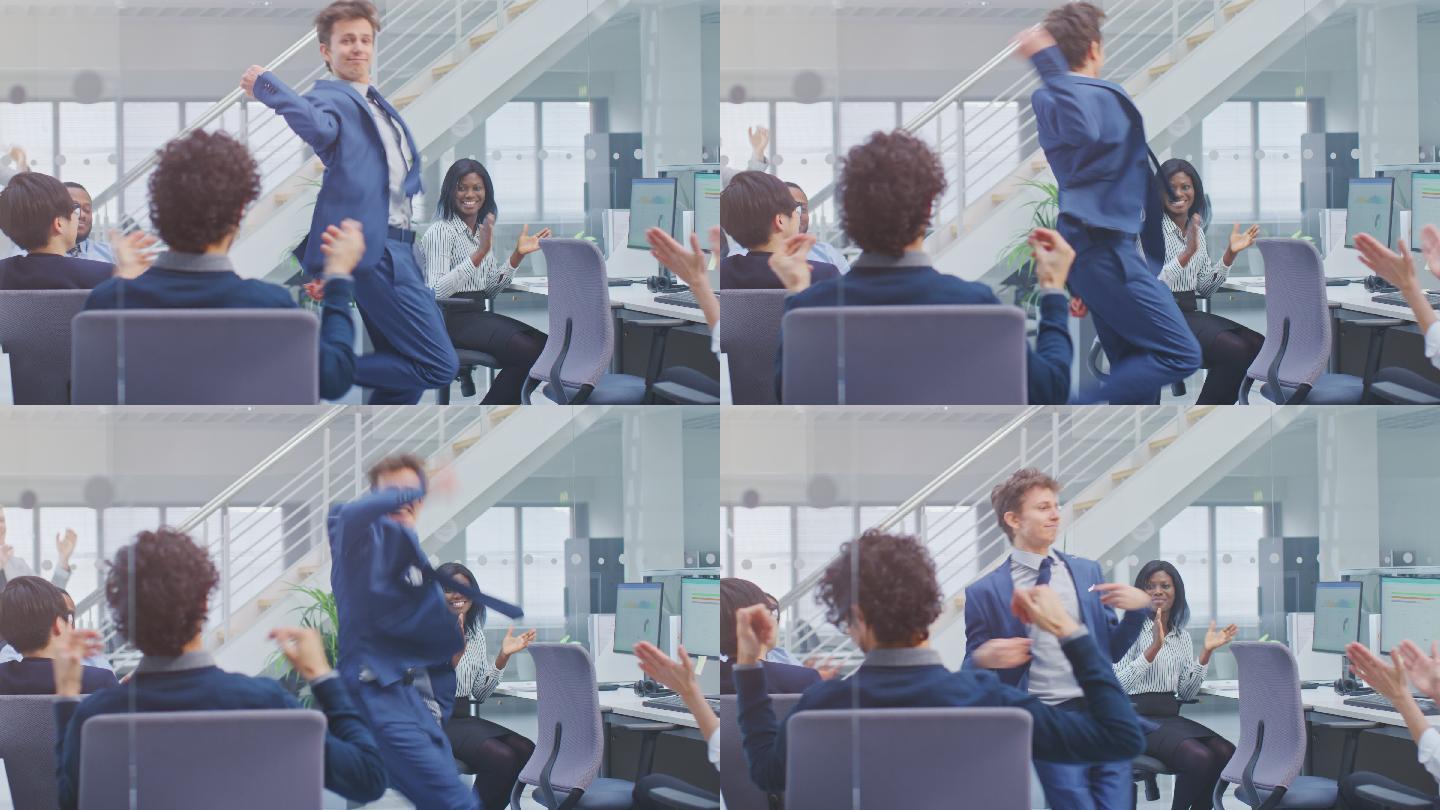 穿着西装的男人在办公室跳舞