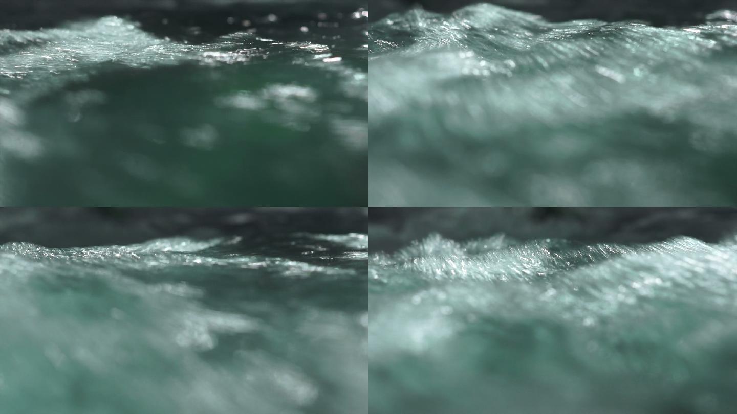 清澈的水从山上流下来特写镜头。