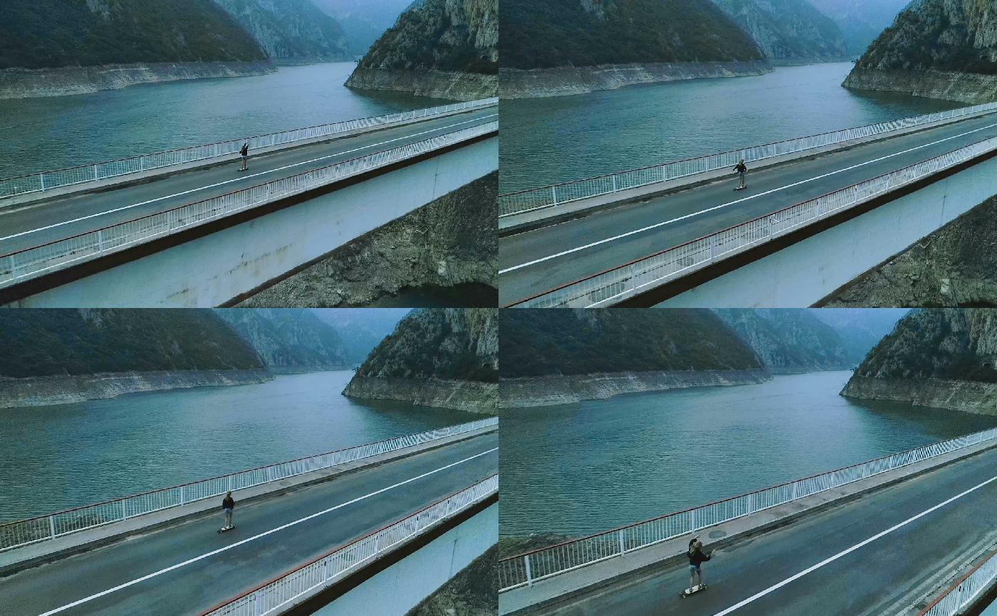 在大桥上滑长板的年轻女子。