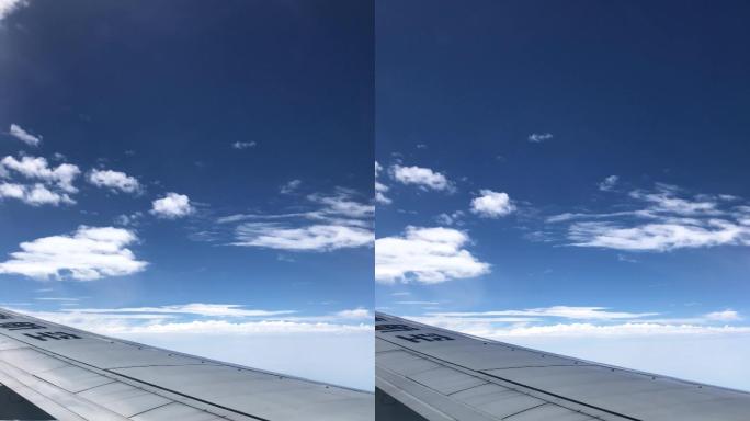 乘客视角拍摄飞机窗外蓝天白云