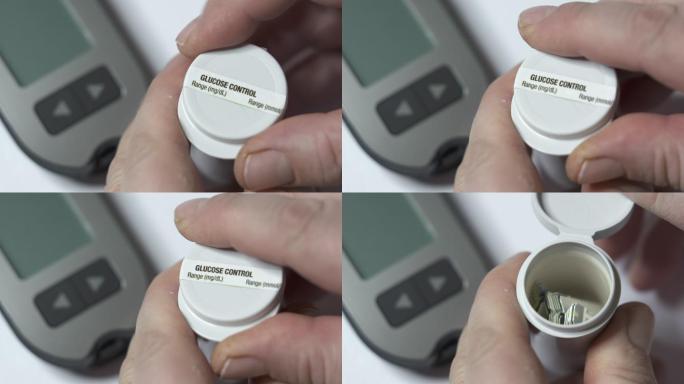 糖尿病患者使用血糖仪检测血糖
