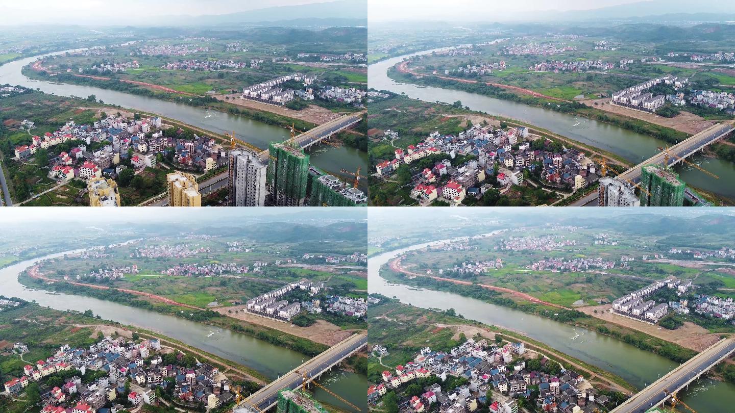 航拍江西省永新县蜿蜒的禾水和村庄
