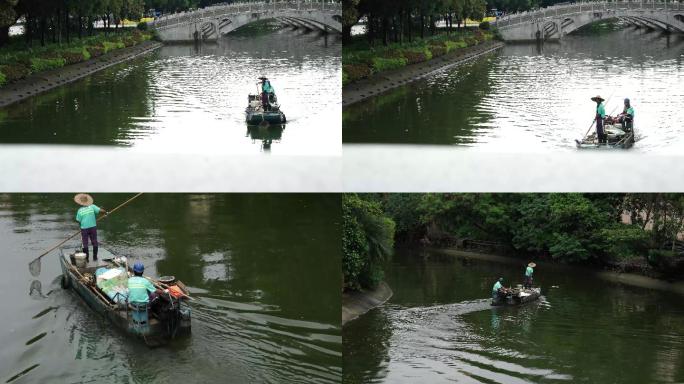 （版权）环卫工人划船清理河道漂浮的垃圾