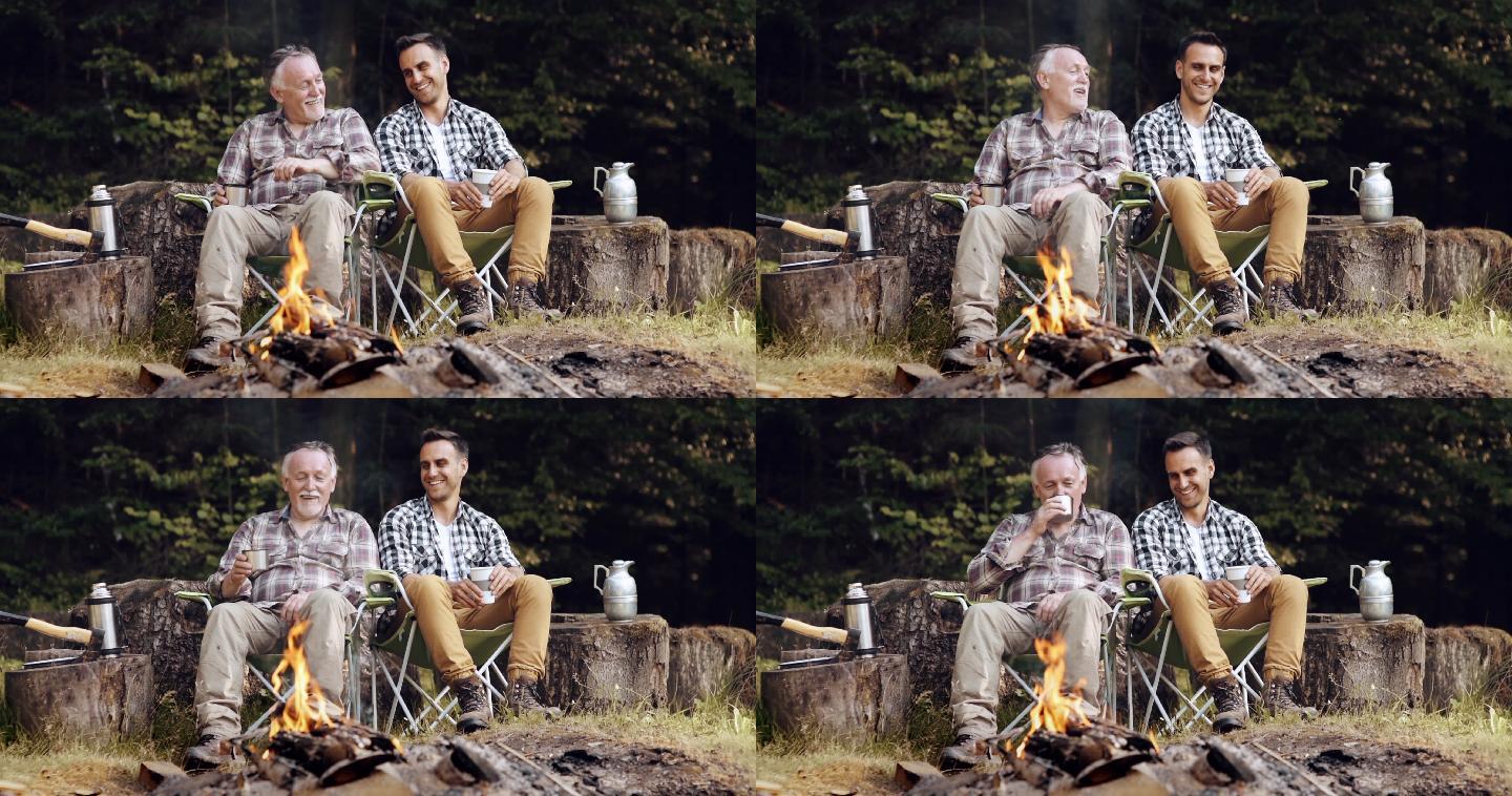 坐在篝火旁休息的人