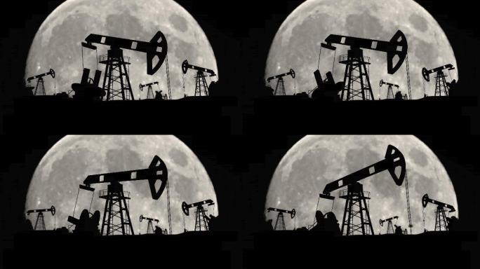 石油产业在夜间月亮背景下打井