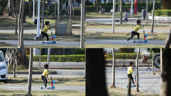 西田体育公园玩滑板车的男孩子