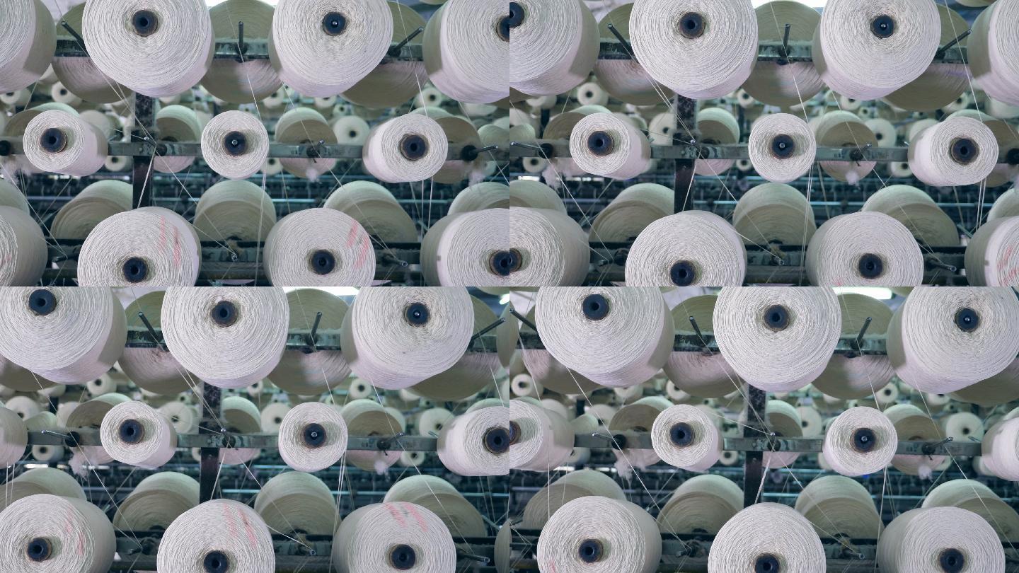 带旋转缝纫卷筒的缝纫机。纺织厂设备。