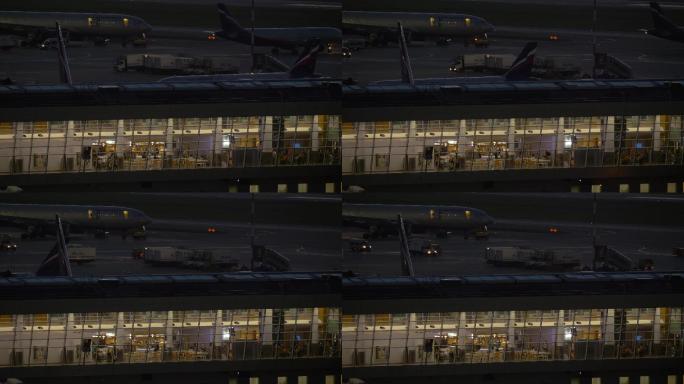 夜间航站楼和飞机交通